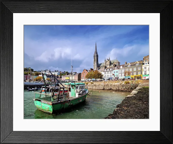 Framed Print : Fishing boats at the waterfront and St. Colman's Cathedral, Cobh, County Cork, Ireland