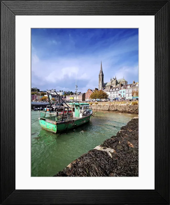 Framed Print : Fishing boats at the waterfront and St. Colman's Cathedral, Cobh, County Cork, Ireland