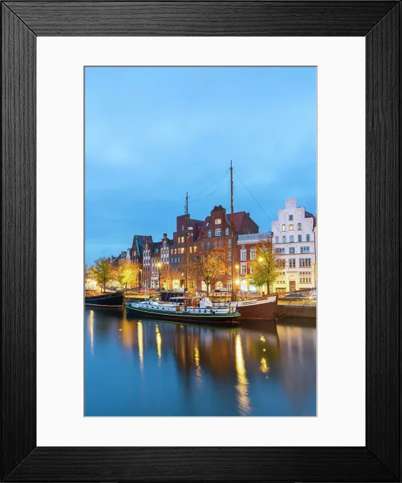 Framed Print : Boats anchored on Trave river and houses with traditional gables in background at twilight, Lubeck, UNESCO, Schleswig-Holstein, Germany Framed Print : Boats anchored on Trave river and houses with traditional gables in background at twilight, Lubeck, UNESCO, Schleswig-Holstein, Germany