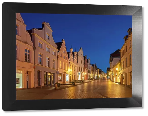 Houses with traditional gables at twilight, Kr√§merstrasse, Wismar, UNESCO, Nordwestmecklenburg, Mecklenburg-Western Pomerania, Germany