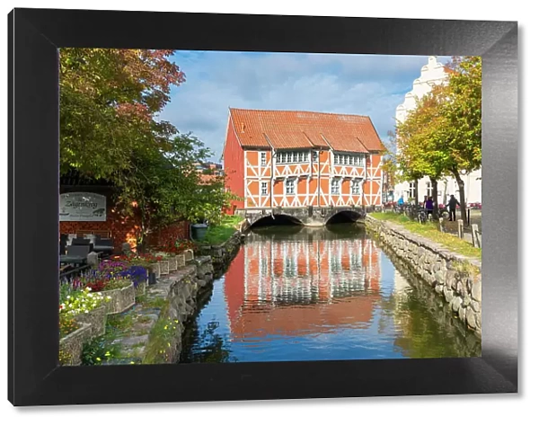 Half-timbered building called Gewolbe (The Vault) and Muhlenbach river, Wismar, UNESCO, Nordwestmecklenburg, Mecklenburg-Western Pomerania, Germany
