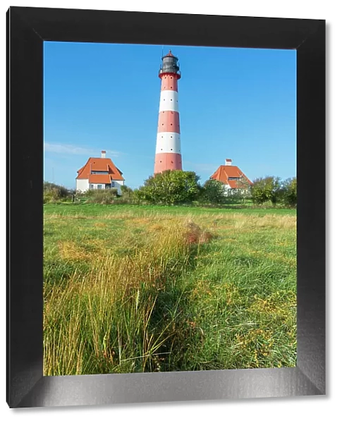 Westerheversand lighthouse against sky, Westerhever, Eiderstedt Peninsula, Nordfriesland, Schleswig-Holstein, Germany
