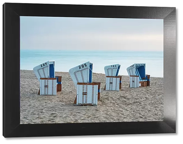 Beach chairs at Hornum beach at dawn, Sylt, Nordfriesland, Schleswig-Holstein, Germany