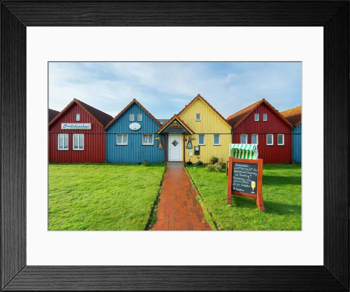 Framed Print : Colorful houses of Seefohrerhus restaurant, Wittdun harbor, Amrum island, Nordfriesland, Schleswig-Holstein, Germany Framed Print : Colorful houses of Seefohrerhus restaurant, Wittdun harbor, Amrum island, Nordfriesland, Schleswig-Holstein, Germany