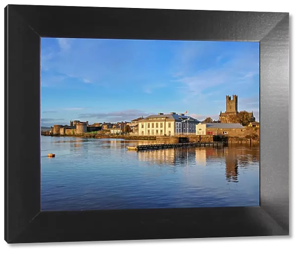 King John's Castle and Saint Mary's Cathedral reflecting in River Shannon at sunset, Limerick, County Limerick, Ireland