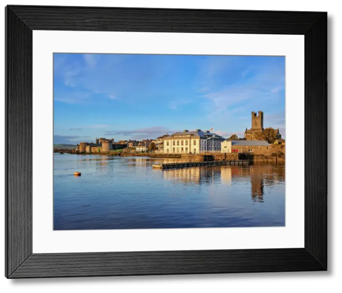 Framed Print : King John's Castle and Saint Mary's Cathedral reflecting in River Shannon at sunset, Limerick, County Limerick, Ireland