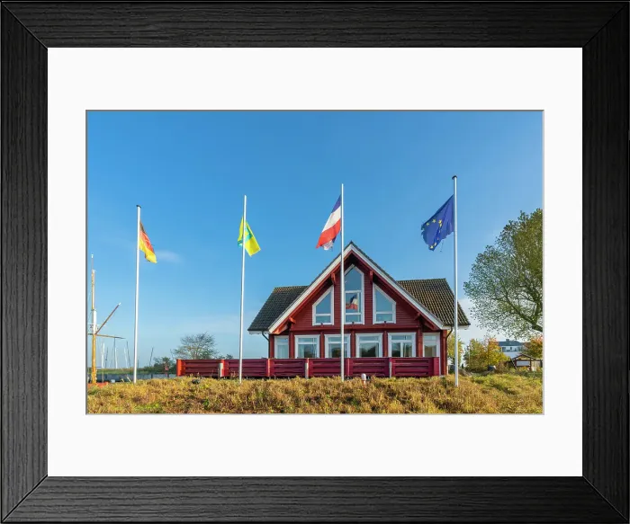 Framed Print : Flags waving in front of Rendez Vous restaurant in Niendorf harbor, Niendorf, Timmendorfer Strand, Ostholstein, Schleswig-Holstein, Germany Framed Print : Flags waving in front of Rendez Vous restaurant in Niendorf harbor, Niendorf, Timmendorfer Strand, Ostholstein, Schleswig-Holstein, Germany
