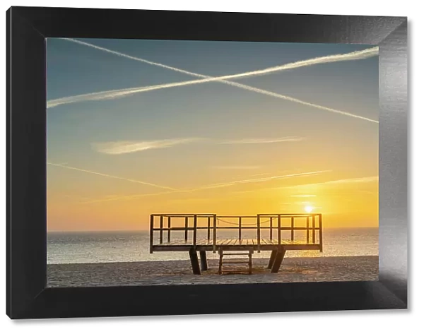 Wooden platform on beach at sunrise, Hornum, Sylt, Nordfriesland, Schleswig-Holstein, Germany