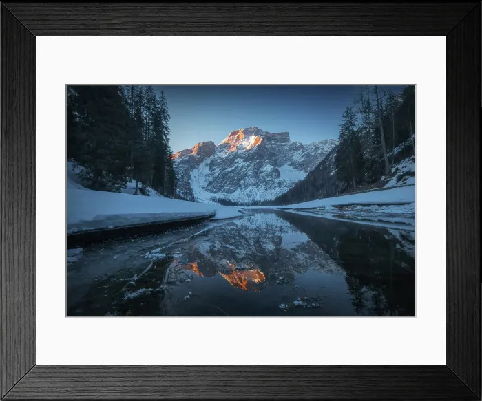 Framed Print : A cold winter sunrise along the frozen shores of the Braies lake (Pragser Wildsee). Dolomites, Italy Framed Print : A cold winter sunrise along the frozen shores of the Braies lake (Pragser Wildsee). Dolomites, Italy