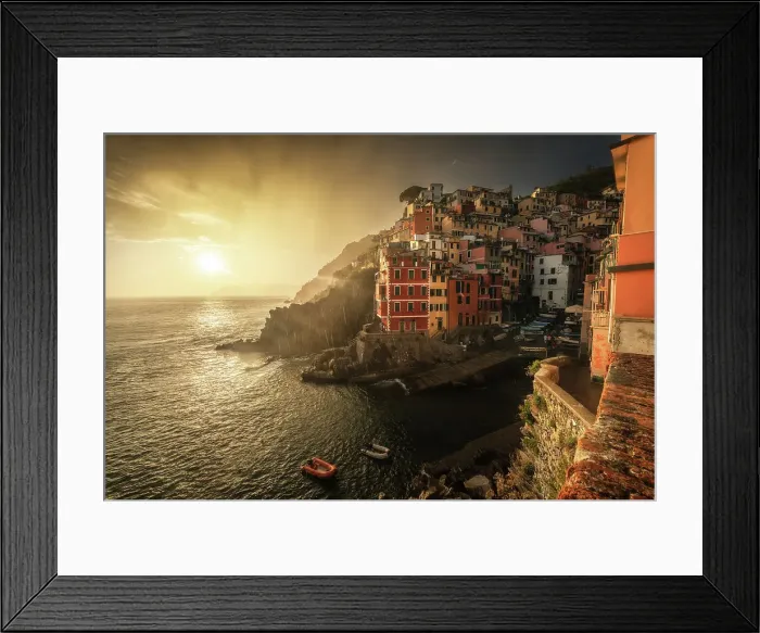 Framed Print : A stormy summer sunset in the town of Riomaggiore, one of the Cinque Terre. Cinque Terre, Italy Framed Print : A stormy summer sunset in the town of Riomaggiore, one of the Cinque Terre. Cinque Terre, Italy