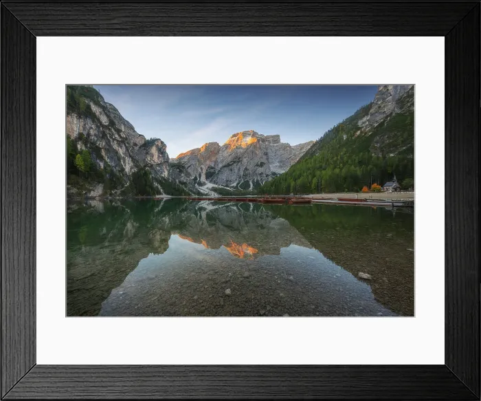 Framed Print : The Braies lake taking the first light of the day on a windy summer morning. Dolomites, Italy Framed Print : The Braies lake taking the first light of the day on a windy summer morning. Dolomites, Italy