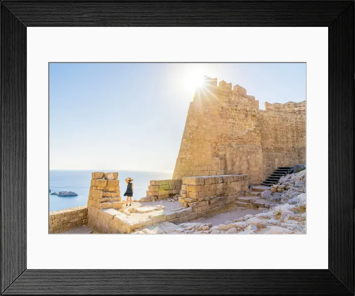 Framed Print : A woman in a hat at the Lindos Acropolis, Lindos, Rhodes, Dodecanese Islands, Greece. (MR)