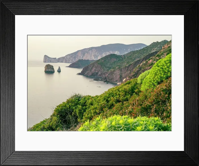 Framed Print : Europe, Italy, Sardinia. The rocky coast near Nebida and the Pan di Zucchero seen from the footpath at sunset Framed Print : Europe, Italy, Sardinia. The rocky coast near Nebida and the Pan di Zucchero seen from the footpath at sunset