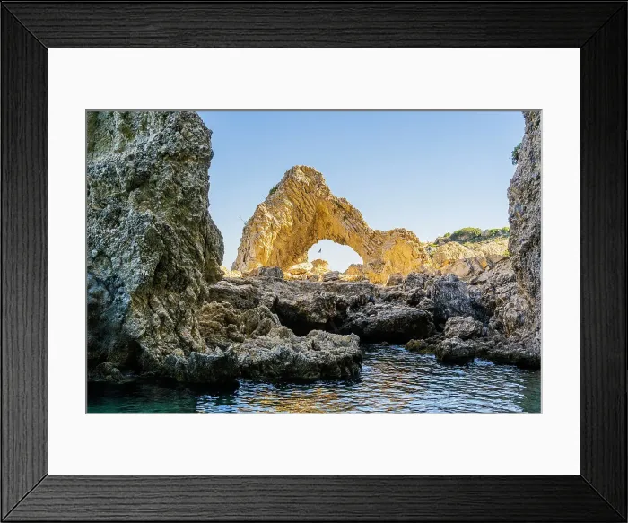 Framed Print : A natural rock arch in Lindos, Rhodes, Dodecanese Islands, Greece Framed Print : A natural rock arch in Lindos, Rhodes, Dodecanese Islands, Greece