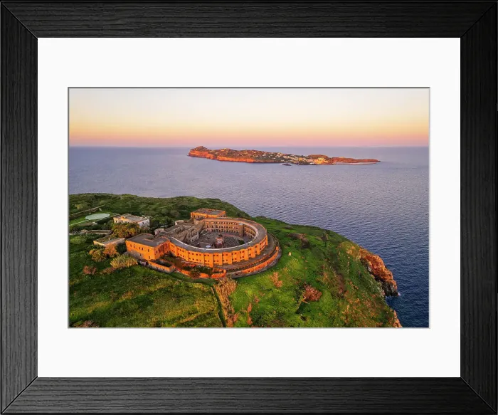Framed Print : The panopticon prison on top of Santo Stefano Island with Ventotene island in the background, Santo stefano and Ventotene Islands, Pontine Islands archipelago, Latium, Italy Framed Print : The panopticon prison on top of Santo Stefano Island with Ventotene island in the background, Santo stefano and Ventotene Islands, Pontine Islands archipelago, Latium, Italy