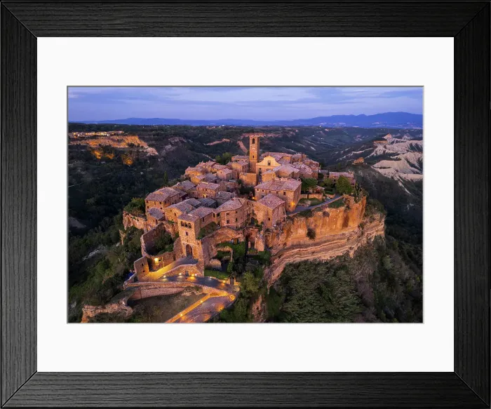 Framed Print : medieval illuminated village of Civita di Bagnoregio at dusk, Viterbo province, Tuscia, Latium, central Italy, Italy Framed Print : medieval illuminated village of Civita di Bagnoregio at dusk, Viterbo province, Tuscia, Latium, central Italy, Italy