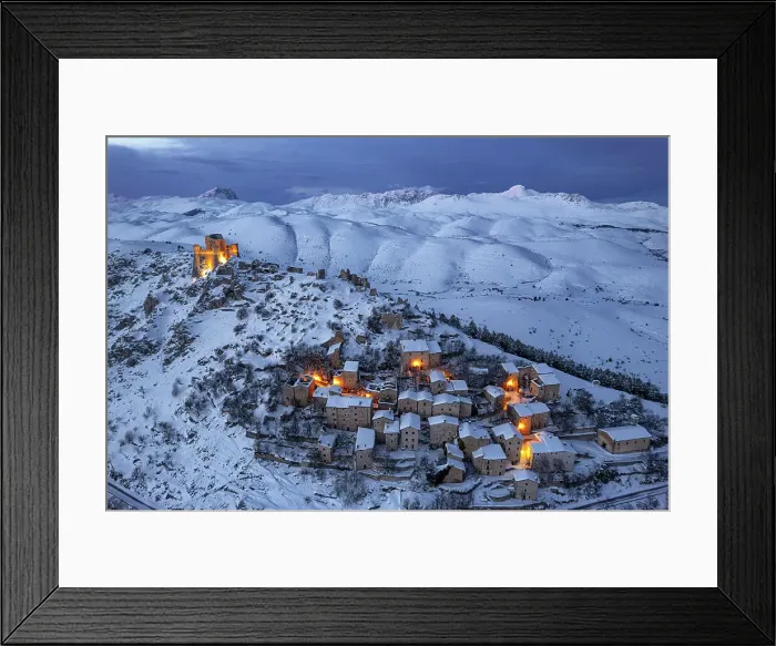 Framed Print : Village and the castle of Rocca Calascio covered with snow, Rocca Calascio, Gran Sasso e Monti della Laga National Park, Apennines, L'Aquila province, Abruzzo region, Italy