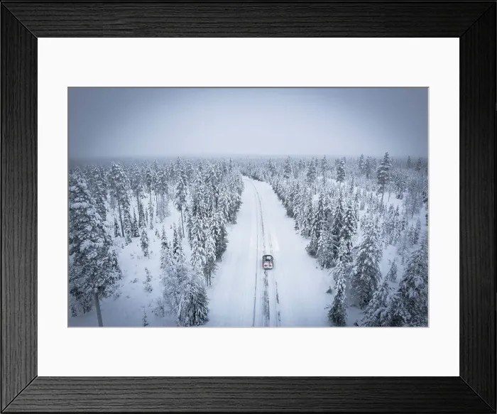 Framed Print : Elevated car along the snowy empty road in the frosty wood, Pallas-Yllastunturi National Park, Muonio, Lapland, Finland Framed Print : Elevated car along the snowy empty road in the frosty wood, Pallas-Yllastunturi National Park, Muonio, Lapland, Finland