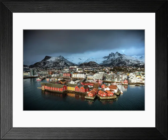 Framed Print : Storm clouds in the foggy sky over the snowcapped mountains surrounding Svolvaer, aerial view, Lofoten Islands, Norway Framed Print : Storm clouds in the foggy sky over the snowcapped mountains surrounding Svolvaer, aerial view, Lofoten Islands, Norway