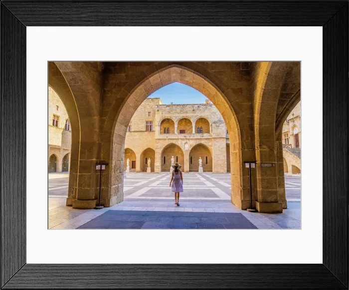 Framed Print : A woman in a hat walking in the Palace of the Grand Master of the Knights of Rhodes, in the Medieval City of Rhodes, UNESCO, Rhodes, Dodecanese Islands, Greece. (MR) Framed Print : A woman in a hat walking in the Palace of the Grand Master of the Knights of Rhodes, in the Medieval City of Rhodes, UNESCO, Rhodes, Dodecanese Islands, Greece. (MR)