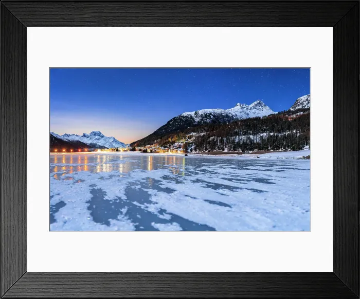 Framed Print : Starry sky over the snowy mountains and Silvaplana village seen from the frozen lake Champfer, Graubunden, Engadin, Switzerland Framed Print : Starry sky over the snowy mountains and Silvaplana village seen from the frozen lake Champfer, Graubunden, Engadin, Switzerland