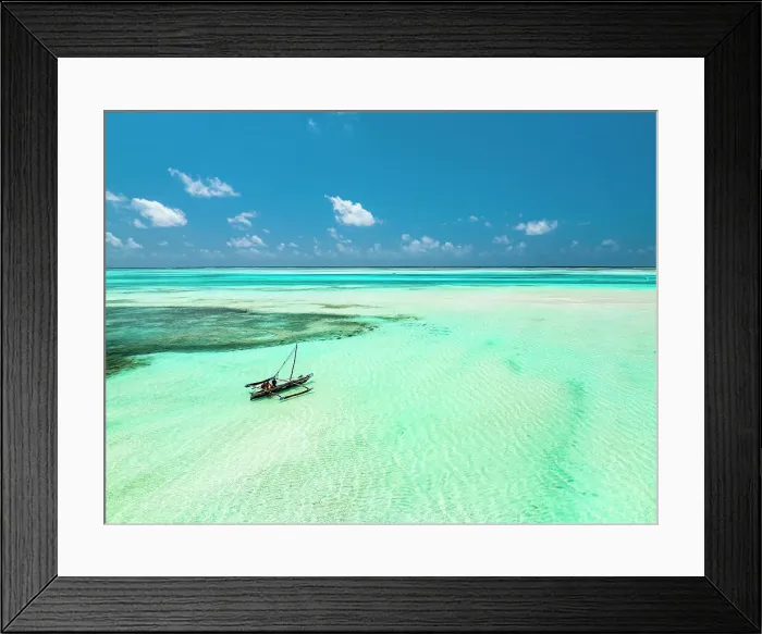 Framed Print : Dhow boat in the turquoise lagoon during low tide, Paje, Jambiani, Zanzibar, Tanzania Framed Print : Dhow boat in the turquoise lagoon during low tide, Paje, Jambiani, Zanzibar, Tanzania