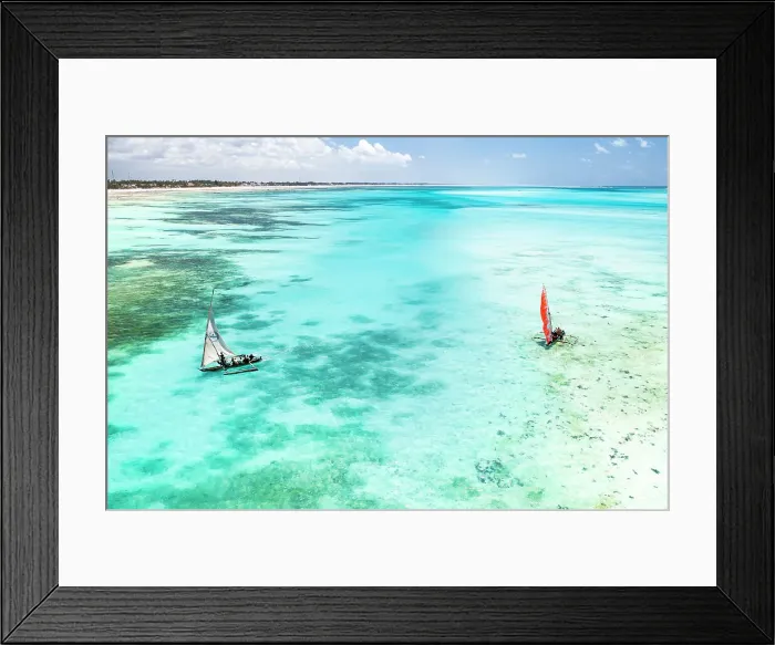 Framed Print : Tourists enjoying a boat trip on traditional dhow in the crystal sea, Paje, Jambiani, Zanzibar, Tanzania Framed Print : Tourists enjoying a boat trip on traditional dhow in the crystal sea, Paje, Jambiani, Zanzibar, Tanzania