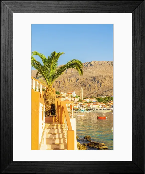 Framed Print : The colourful harbour and Saint Nicholas church in the background, Halki, Chalki, Dodecanese Islands, Greece Framed Print : The colourful harbour and Saint Nicholas church in the background, Halki, Chalki, Dodecanese Islands, Greece