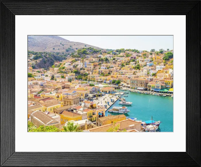 Framed Print : Elevated view over the colourful harbour in Symi, Dodecanese Islands, Greece Framed Print : Elevated view over the colourful harbour in Symi, Dodecanese Islands, Greece