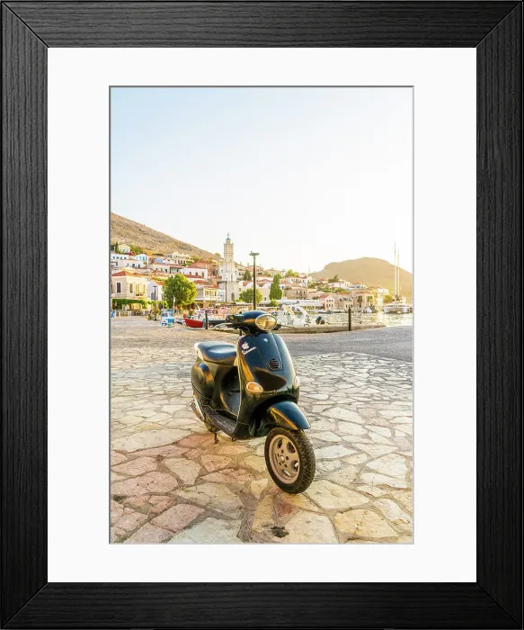 Framed Print : A Vespa motor cycle by the Harbour in Halki, Dodecanese Islands, Greece Framed Print : A Vespa motor cycle by the Harbour in Halki, Dodecanese Islands, Greece