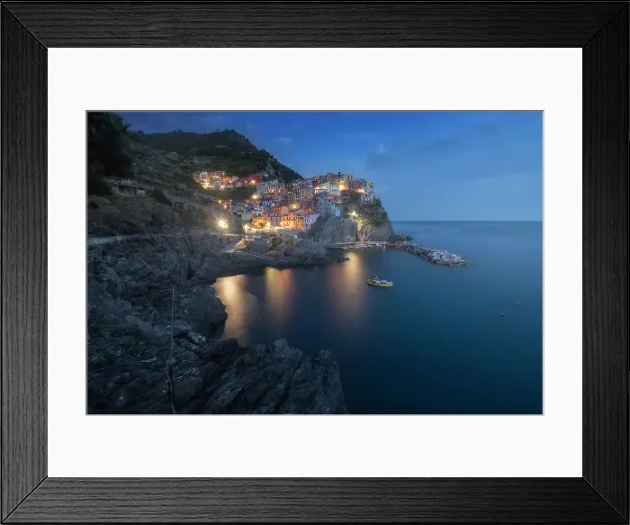 Framed Print : Blue hour over the small fishermen's town of Manarola, part of Cinque Terre in Liguria, in spring. Cinque Terre, Italy