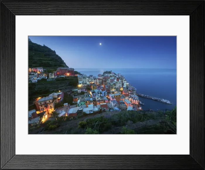 Framed Print : Rising moon over the small fishermen's town of Manarola, part of Cinque Terre in Liguria, in spring. Cinque Terre, Italy