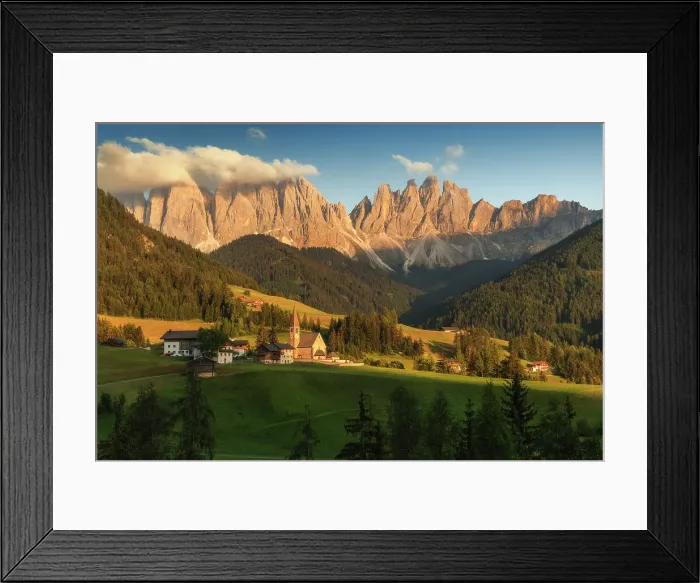 Framed Print : The classic view of the Santa Magdalena church during a summer sunset, with the Odle rising tall in the background. Dolomites, Italy Framed Print : The classic view of the Santa Magdalena church during a summer sunset, with the Odle rising tall in the background. Dolomites, Italy