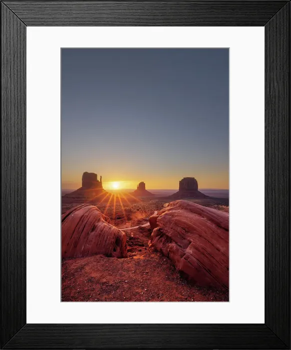 Framed Print : USA, Arizona, sun rising between the buttes at the Monument Valley