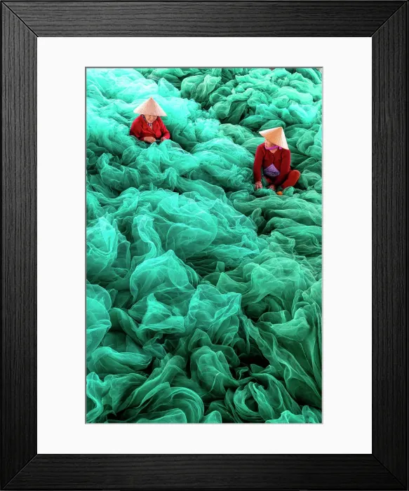 Framed Print : Vietnam, Cam Ranh, women mend green fishing nets Framed Print : Vietnam, Cam Ranh, women mend green fishing nets