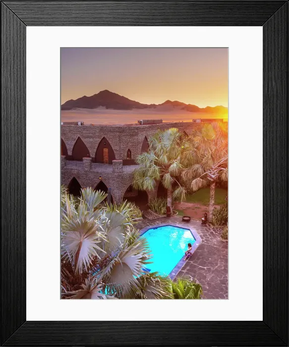 Framed Print : Namibia, a swimming pool in a luxury hotel in the Namib Naukluft National Park with the sun setting on the Namib desert dunes Framed Print : Namibia, a swimming pool in a luxury hotel in the Namib Naukluft National Park with the sun setting on the Namib desert dunes