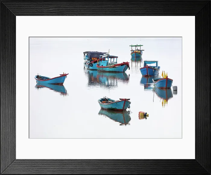Framed Print : Vietnam, Cam Ranh, traditional fishing boats reflected in calm water Framed Print : Vietnam, Cam Ranh, traditional fishing boats reflected in calm water