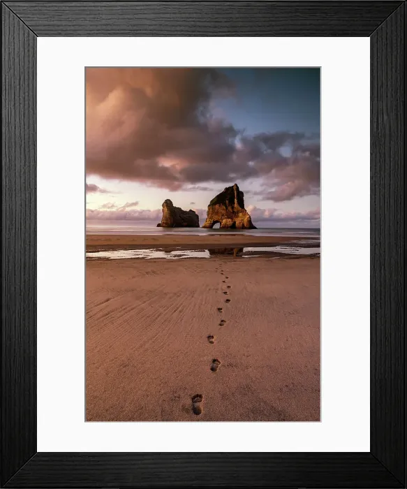 Framed Print : Footprints leading to Archway Islands, Wharariki Beach, South Island, New Zealand Framed Print : Footprints leading to Archway Islands, Wharariki Beach, South Island, New Zealand