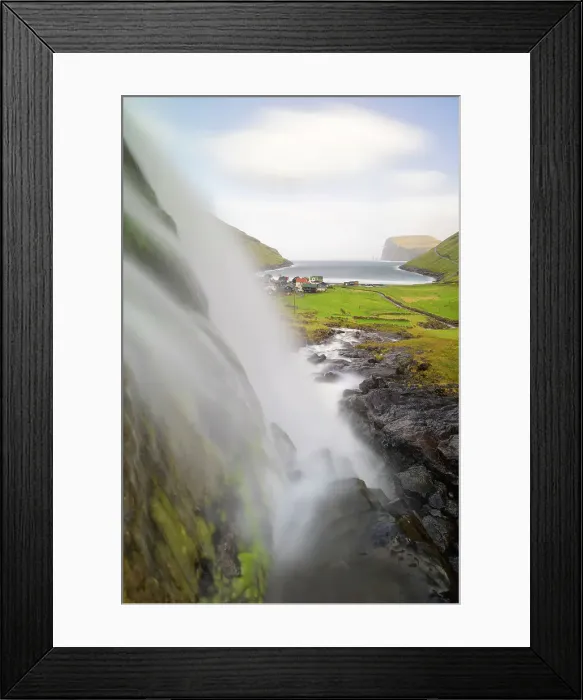 Framed Print : Small waterfall and Tjornuvik village, Sunda municipality, Streymoy, Faroe Islands, Denmark Framed Print : Small waterfall and Tjornuvik village, Sunda municipality, Streymoy, Faroe Islands, Denmark
