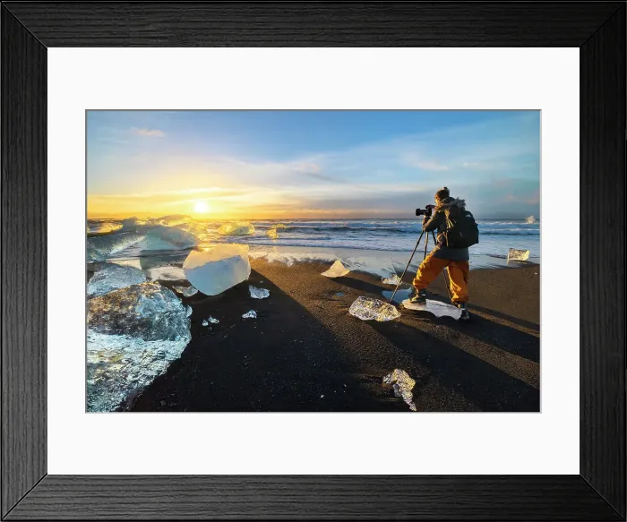 Framed Print : A photographer at Diamond Beach, Jokulsarlon, Diamond beach, Austurland, Iceland (MR)