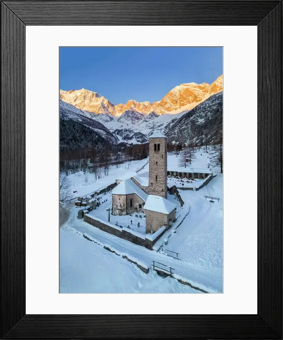 Framed Print : Sunrise in front of Monte Rosa from the old church of Macugnaga in winter. Valle Anzasca, Ossola, province of Verbania, Piedmont, italian alps, Italy Framed Print : Sunrise in front of Monte Rosa from the old church of Macugnaga in winter. Valle Anzasca, Ossola, province of Verbania, Piedmont, italian alps, Italy