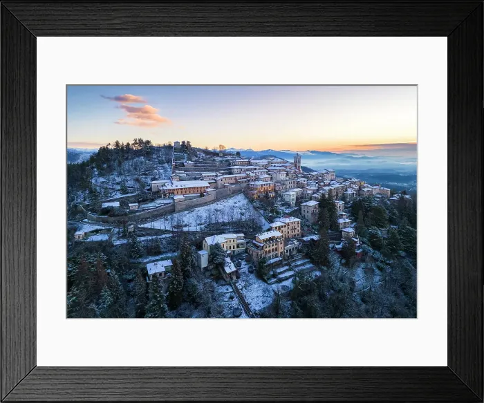 Framed Print : Santa Maria del Monte after a snowfall in winter at sunrise. Varese, Parco Campo dei Fiori, Lombardy, Italy Framed Print : Santa Maria del Monte after a snowfall in winter at sunrise. Varese, Parco Campo dei Fiori, Lombardy, Italy