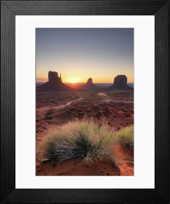 Framed Print : USA, Arizona, sun rising between the buttes at the Monument Valley