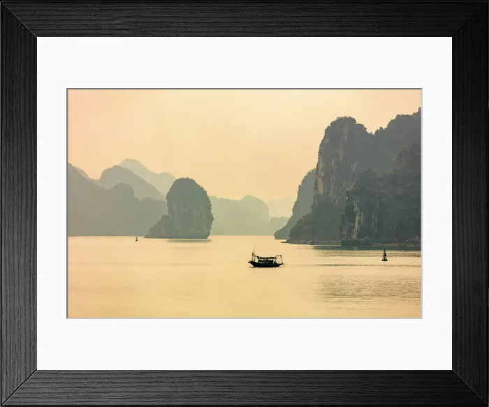 Framed Print : Vietnam, Quang Ninh Province, , Halong Bay, a fishing boat surrounded by Karst mountains Framed Print : Vietnam, Quang Ninh Province, , Halong Bay, a fishing boat surrounded by Karst mountains