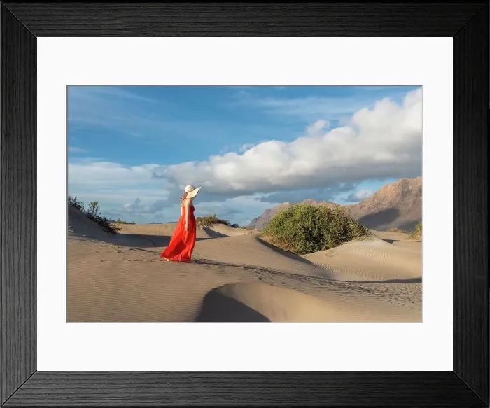 Framed Print : Beautiful girl with red dress walks in the sand dunes of Famara, Lanzarote, Canary Island, Spain Framed Print : Beautiful girl with red dress walks in the sand dunes of Famara, Lanzarote, Canary Island, Spain