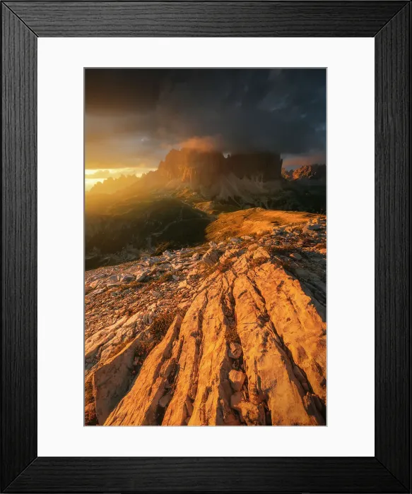 Framed Print : A blazing sunset light over the south face of the Tre Cime di Lavaredo after a passing storm. Dolomites, Italy Framed Print : A blazing sunset light over the south face of the Tre Cime di Lavaredo after a passing storm. Dolomites, Italy