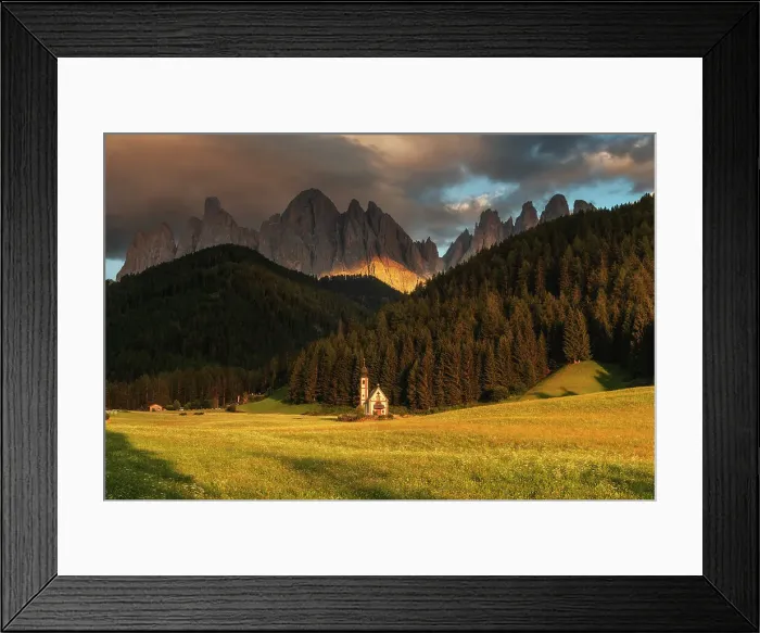Framed Print : The small chapel of San Giovanni in Ranui taking the last light of the day with the imposing Odle mountains in the background. Dolomites, Italy Framed Print : The small chapel of San Giovanni in Ranui taking the last light of the day with the imposing Odle mountains in the background. Dolomites, Italy