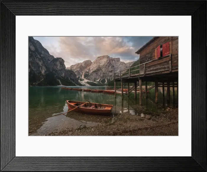 Framed Print : The Braies lake taking the first light of the day on a calm, cloudy summer morning. Dolomites, Italy Framed Print : The Braies lake taking the first light of the day on a calm, cloudy summer morning. Dolomites, Italy