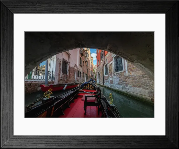 Framed Print : A gondola ride in Venice, navigating through the small canals of the city centre. Venice, Italy Framed Print : A gondola ride in Venice, navigating through the small canals of the city centre. Venice, Italy
