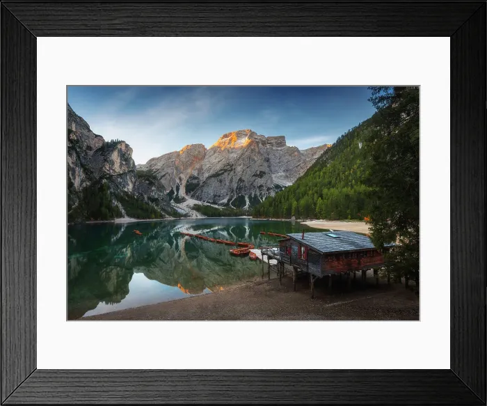 Framed Print : The Braies lake taking the first light of the day on a calm early autumn morning. Dolomites, Italy